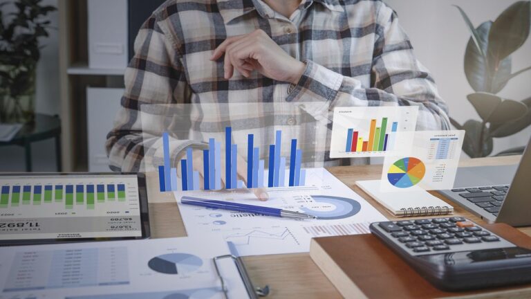 businesspeople working in finance and accounting analyze financi