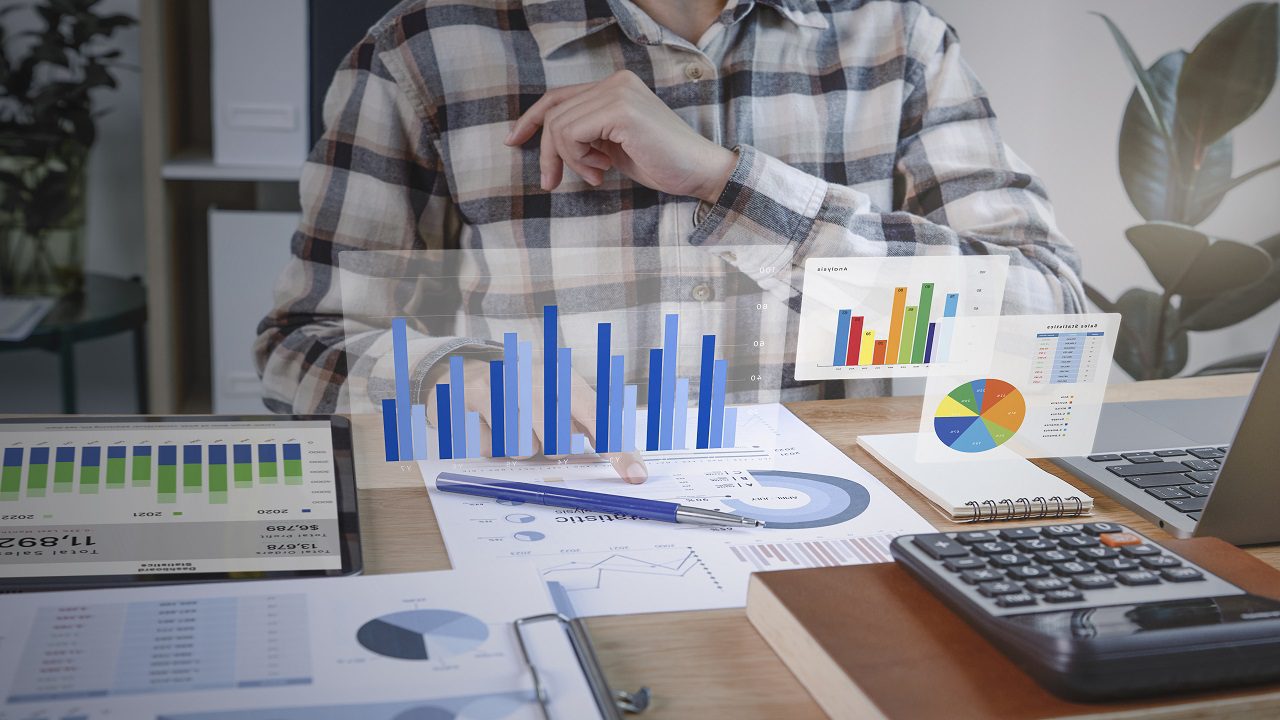 businesspeople working in finance and accounting analyze financi